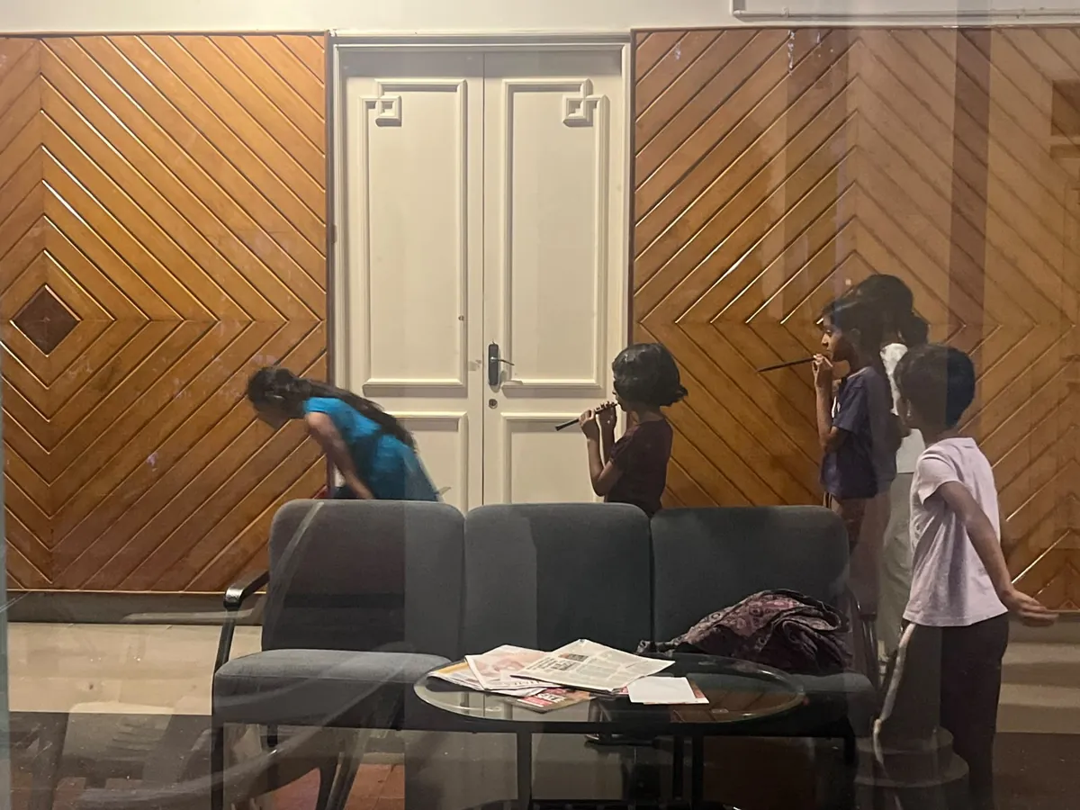 Children at a DeepKids playtest, one taking their turn while the others watch